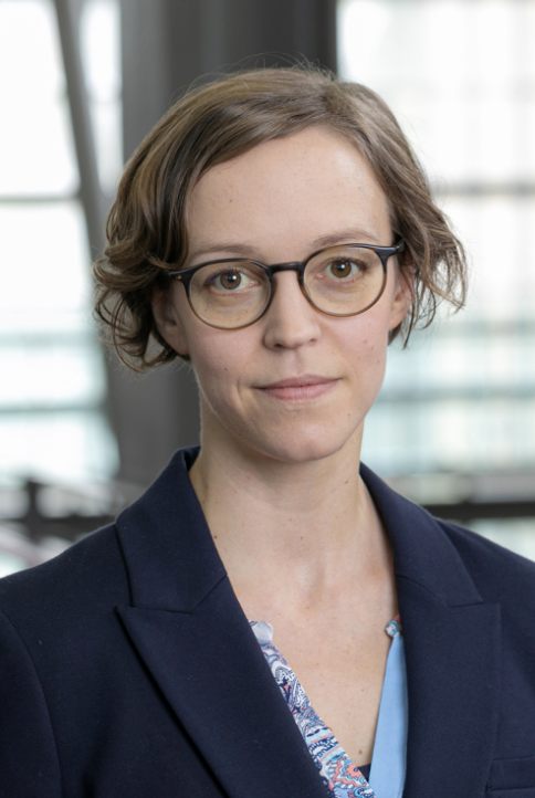 Photo of Prof. Nina Varsava. She is wearing glasses and a navy blue suit.